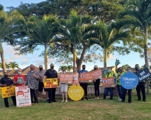 BE policy_street safety sign waving