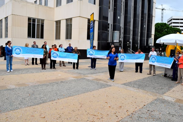City_celebration_Suzanne_with_banners.jpg